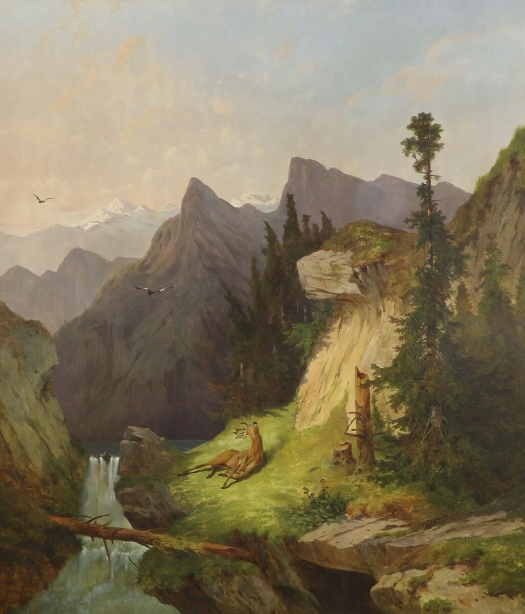 Paesaggio alpino con cervo caduro
